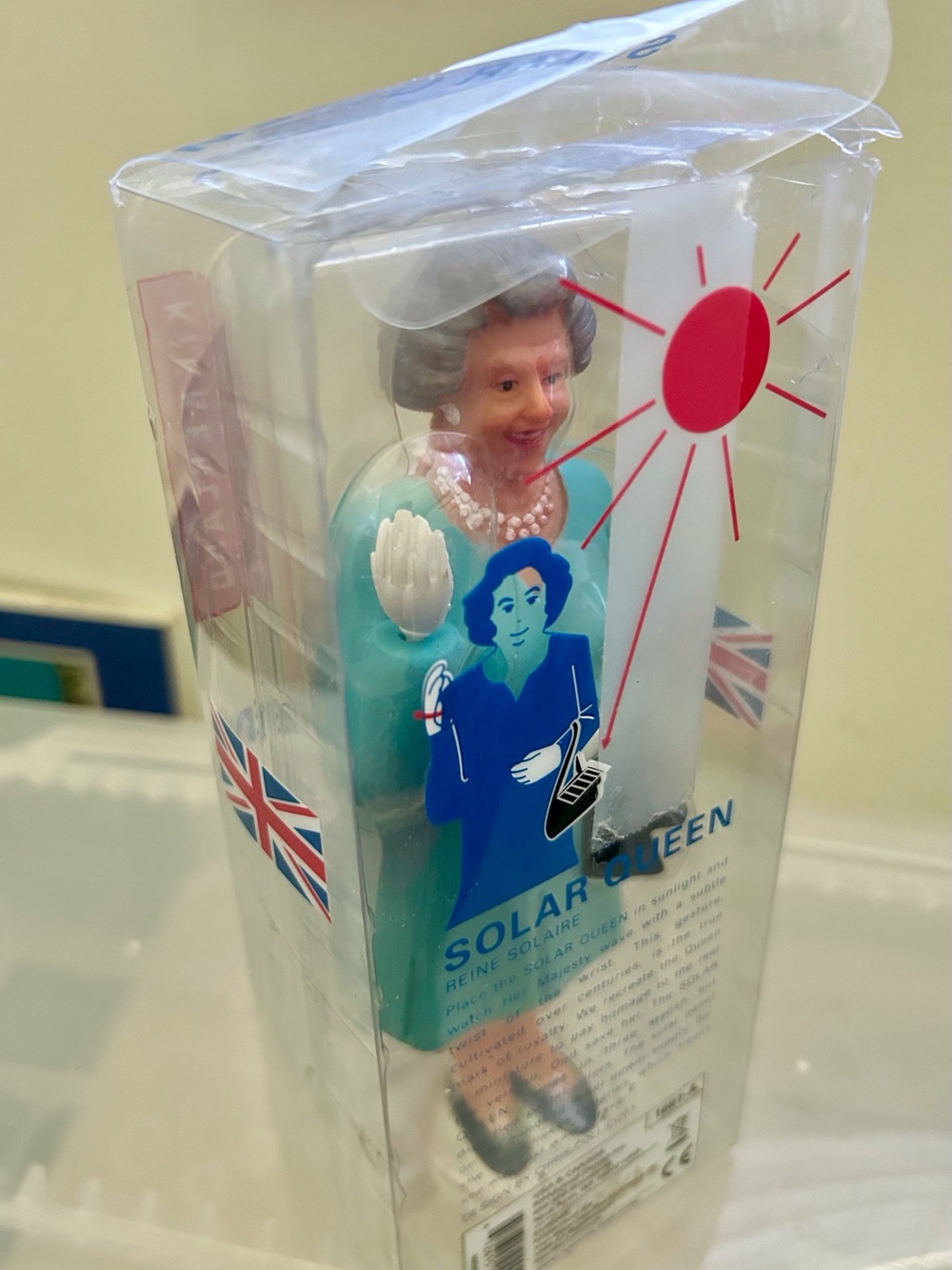 Kikkerland Solar Queen Figurine Waving - Blue Dress, Tribute to Queen Elizabeth.
